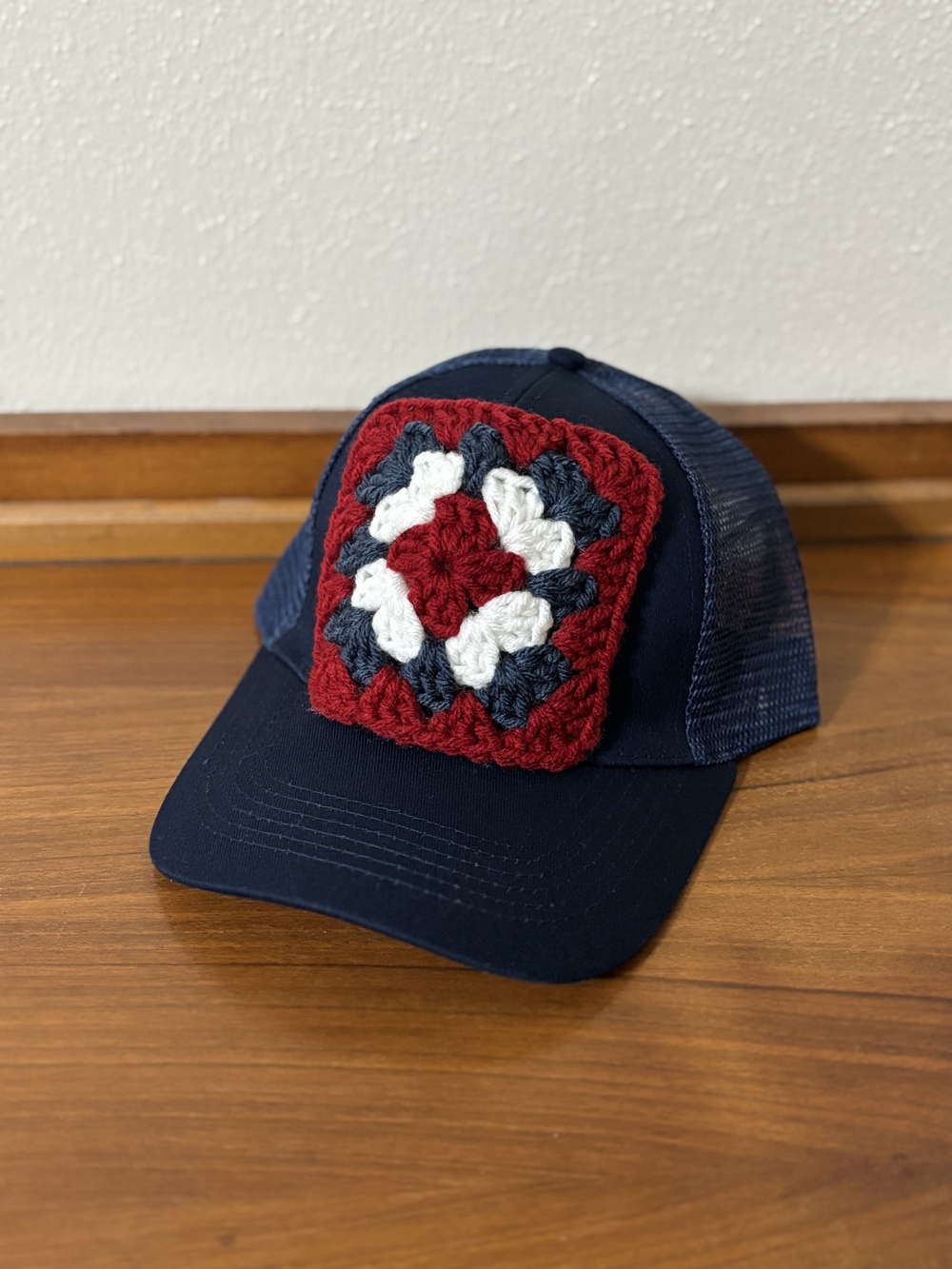 Ladie's Navy Trucker Hat with Red, White & Blue Hand-Crochet Patch